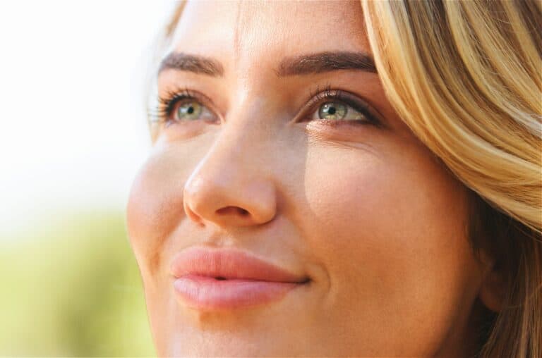 blonde woman amazing nose job