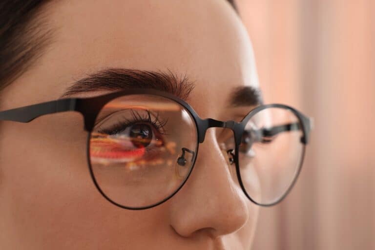 close up of woman wearing stylish black glasses
