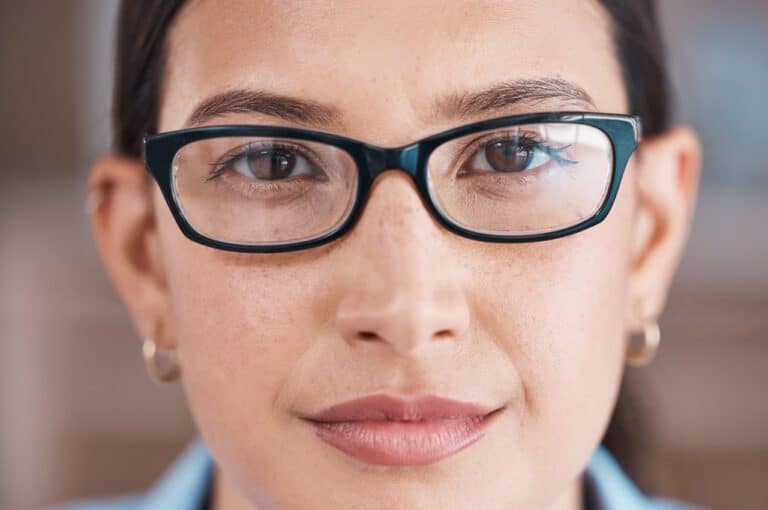 headshot of woman wearing glasses